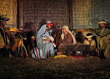 Mary and Joseph and the baby Jesus, portrayed by Whitney Kitchens, Carlos Motta and Hudson Drake.