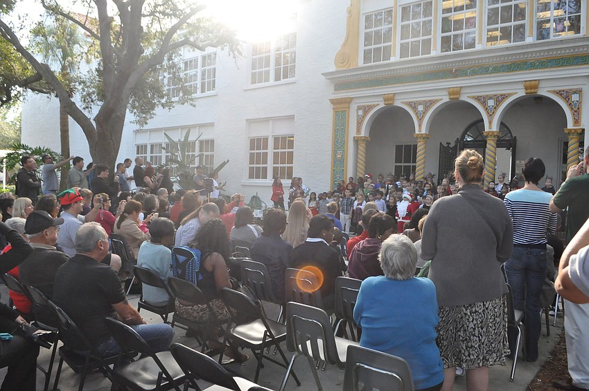 Parents snapped photographs and watched their children perform.