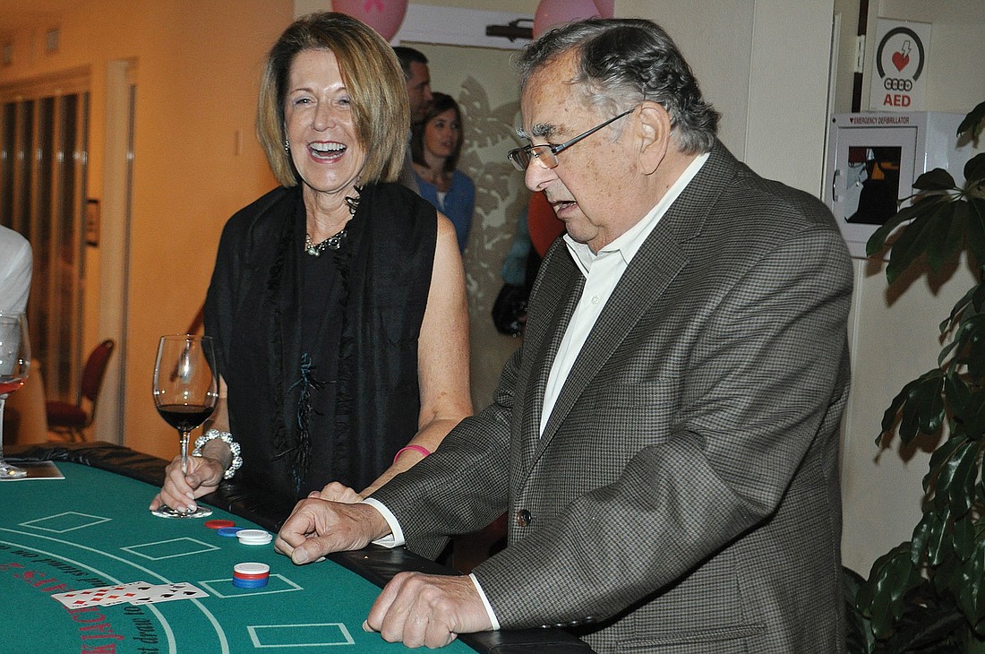 aureen Curtin and Alan Stone played their cards right Feb. 8, at the Ã¢â‚¬Å“Go for the CureÃ¢â‚¬Â casino night fundraiser held at the Longboat Key Club and Resort.