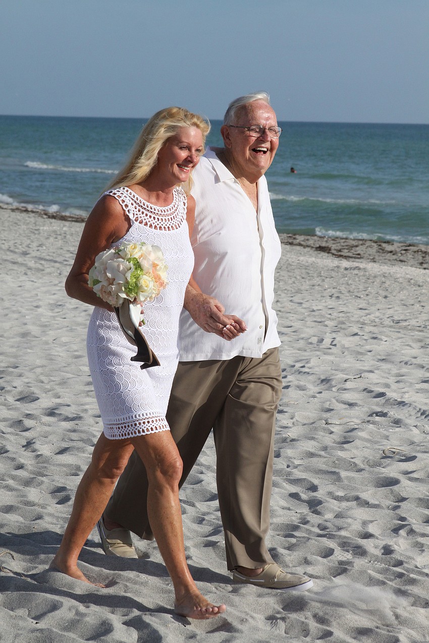 Adm. Steve Branham married Susan Phillips July 28 in a beach ceremony on Longboat Key.