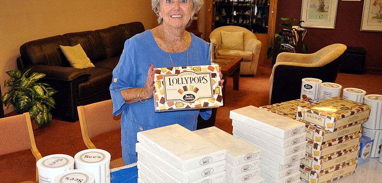 Bonney Libman bought gourmet lollipops from See's Candy at Temple Beth Israelâ€™s Dec. 2 Holiday Happening Sale.