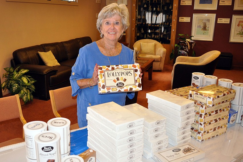 Bonney Libman bought gourmet lollipops from See's Candy at Temple Beth Israelâ€™s Dec. 2 Holiday Happening Sale.