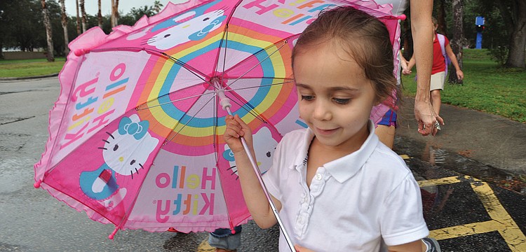 Maya Griffin, 4, is prepared for the rain, during International Walk to School Day at Braden River Elementary Oct. 3. Published Oct. 11, 2012.