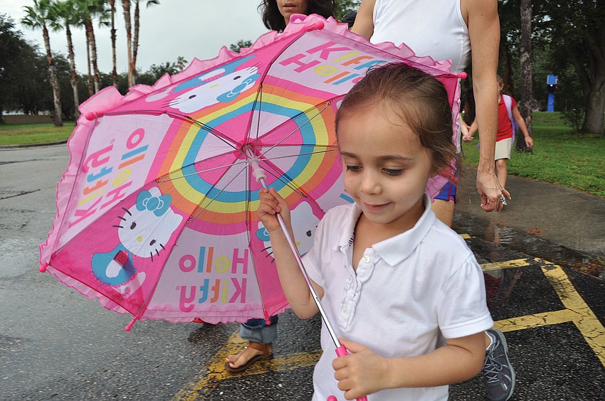 Maya Griffin, 4, is prepared for the rain, during International Walk to School Day at Braden River Elementary Oct. 3. Published Oct. 11, 2012.