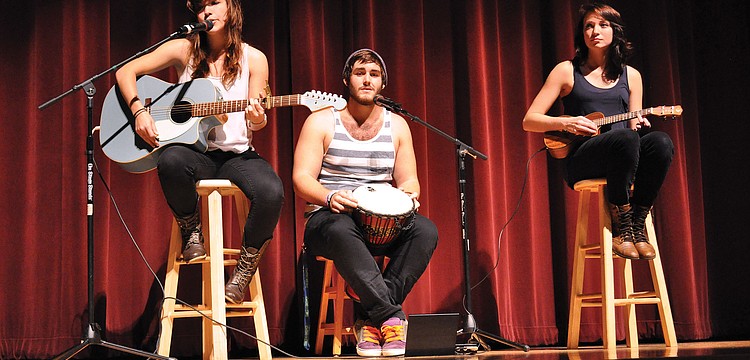 Daphne VonCannon, Israel Olma and Lexi Moore perform â€œStill Havenâ€™t Found What Iâ€™m Looking Forâ€ during Braden River High Schoolâ€™s Talent Show Nov. 29, in the schoolâ€™s auditorium. Published Dec. 6, 2012.