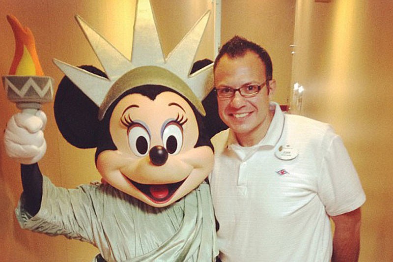 Minnie Mouse poses with Juan Luis Torres II