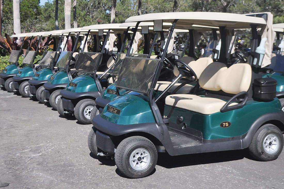 A new fleet of golf carts for club members is one of several upgrades at the Longboat Key Club and Resort.  Photo by Katie Hendrick.