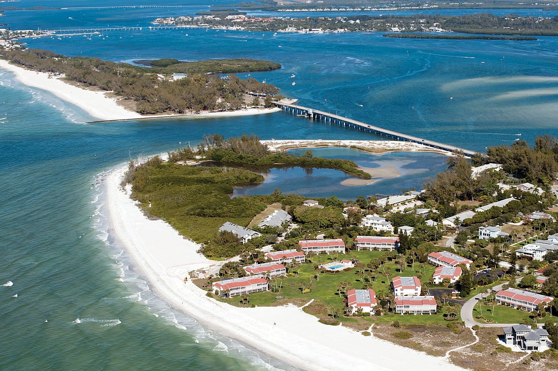The north end of Longboat Key, after an emergency sand renourishment project was performed in June 2011, shows a wide beach that connects Beer Can Island to Longboat Key. Most of the placed sand is gone now. Jack Elka.