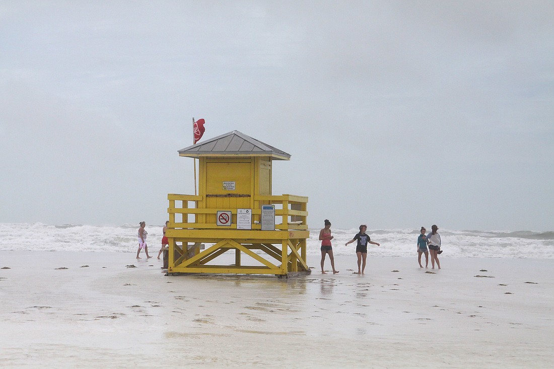 Tropical Storm Debby left little of America's No. 1 Beach exposed Monday, June 24 as the surf stretched more than 100 feet north of Siesta Key Beach lifeguard stands. Photos by Rachel S. O'Hara.