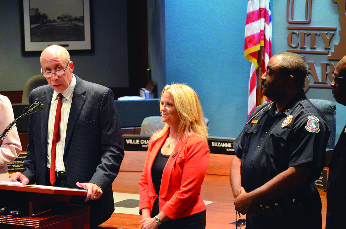 City Manager Tom Barwin introduced new Police Chief Bernadette DiPino Oct. 16.