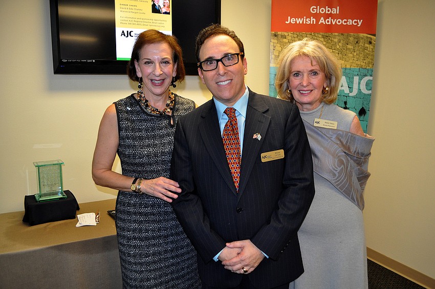 Executive Director Brian Lipton poses with past president Sue Jacobson and current president Anne Virag Thursday, Jan. 10 at the AJC West Coast Florida office.