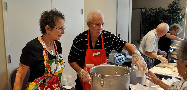Rona and Hy Polakoff serve up cabbage soup.