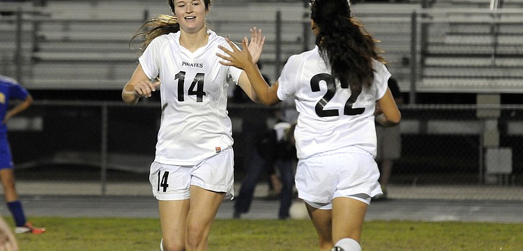 Braden Riverâ€™s Carly Provan is congratulated by one of her teammates after scoring her second goal in the final seconds of the match.