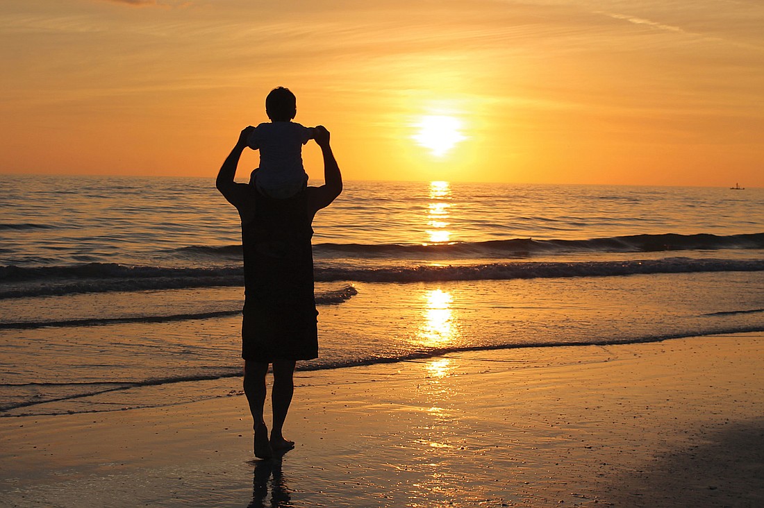 Laurie Krampits submitted this photo of a father and son enjoying the sunset on Siesta Key.