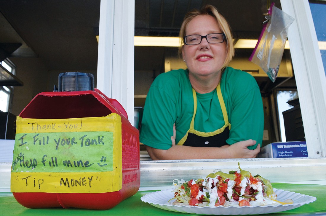 Michelle Jett started preparations at Baja Boys Grill at 6:30 a.m. Jan. 11.