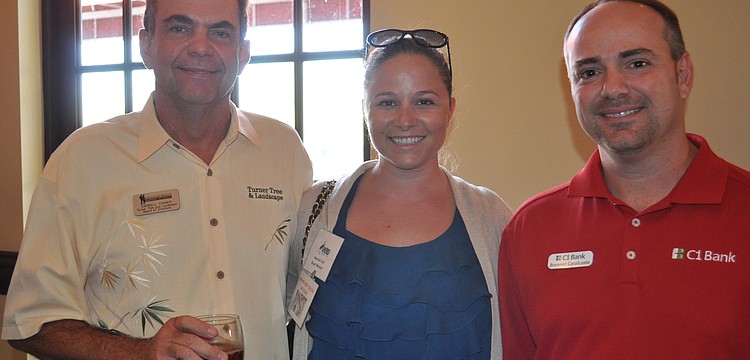 Darrell Turner of Turner Tree and Landscape, Gabriele Vest of Grapevine Communications and Brenner Cavalcante of C1 Bank