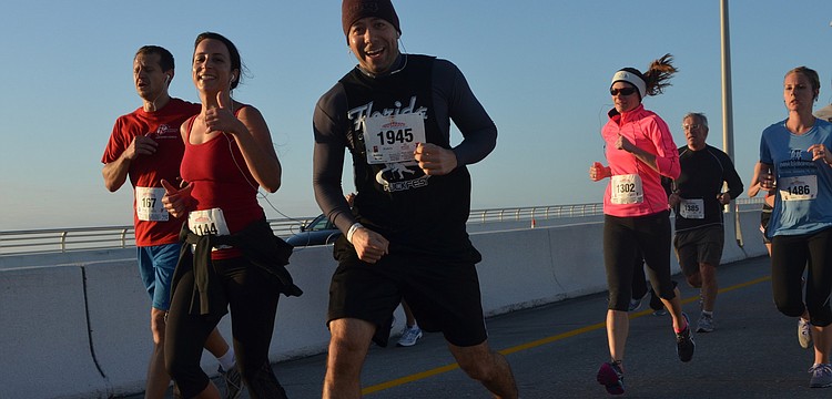 Cameron Bahan, Michelle Jordan, Paul De Santis, Blake Lyon, Dennis Mitrano and Jaynie Peterson run down Ringling Bridge.