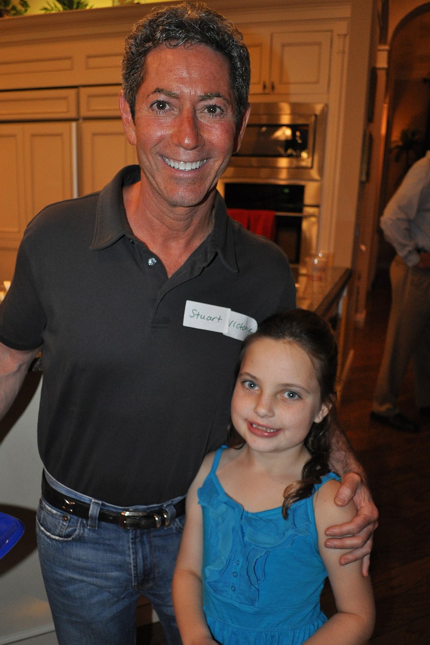 Stuart Roth, of Salt & Light Productions, with his fiancee's niece, Victoria Hefner, 6.