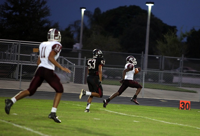 Richie James, No. 2, makes a run for it down the field to score the first touchdown of the game Friday, Sept. 21 during the Braden River versus Riverview game at Braden River.