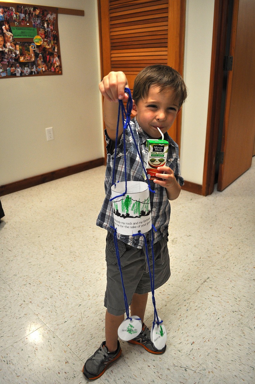 Reef Teffenhart, 4 Â½, shows off his Moses mobile.