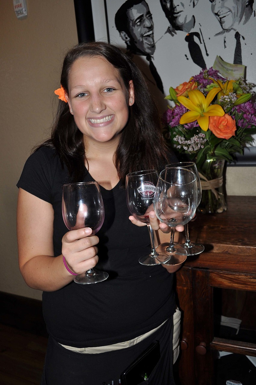 Truman's Shelby Terry refilled drinks for guests.