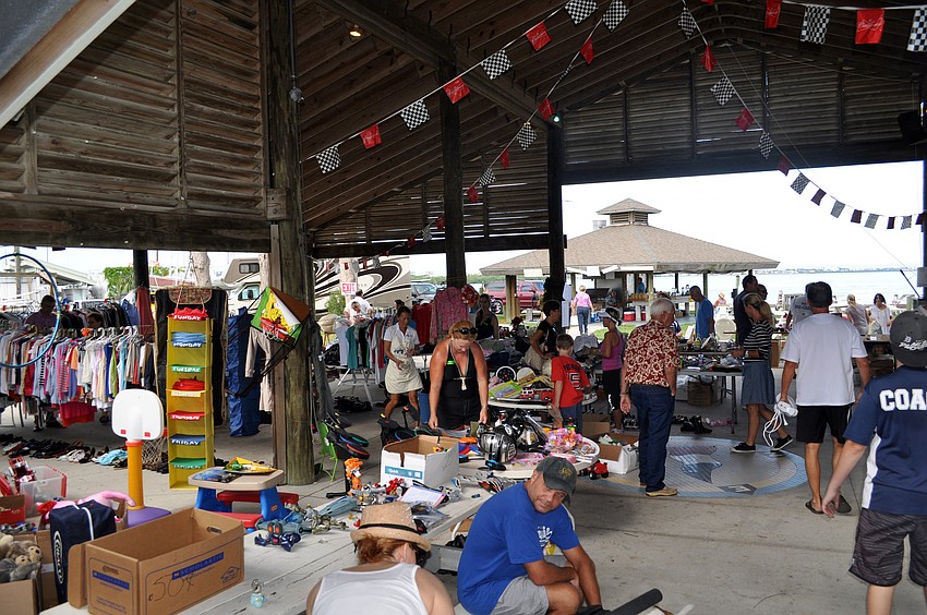 There were thousands of items for sale from bake ware and tablecloths to clothes and toys to boats and paintings Saturday, Oct. 6 at the Sarasota Sailing Squadron.