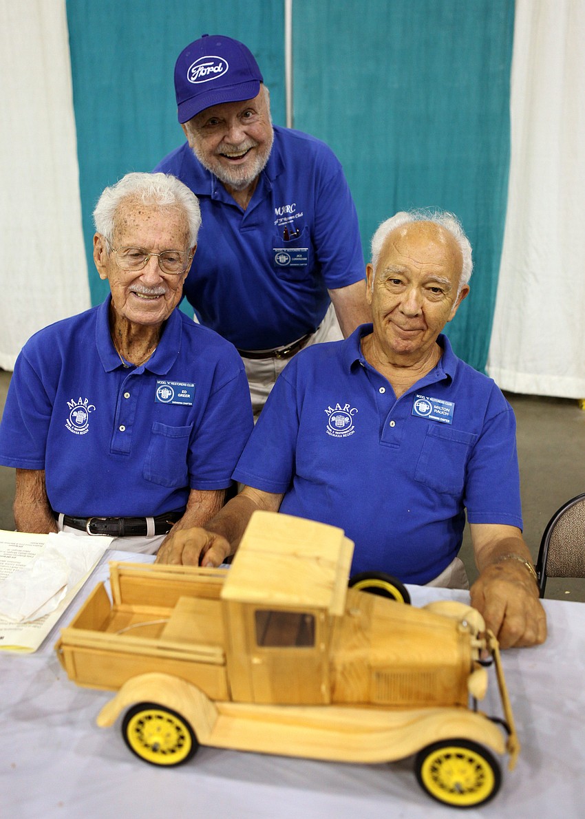 Members of the Model â€œAâ€ Restorers Club, Ed Greer, Joe Cunningham and Milton Rauch pose with Rauchâ€™s model.
