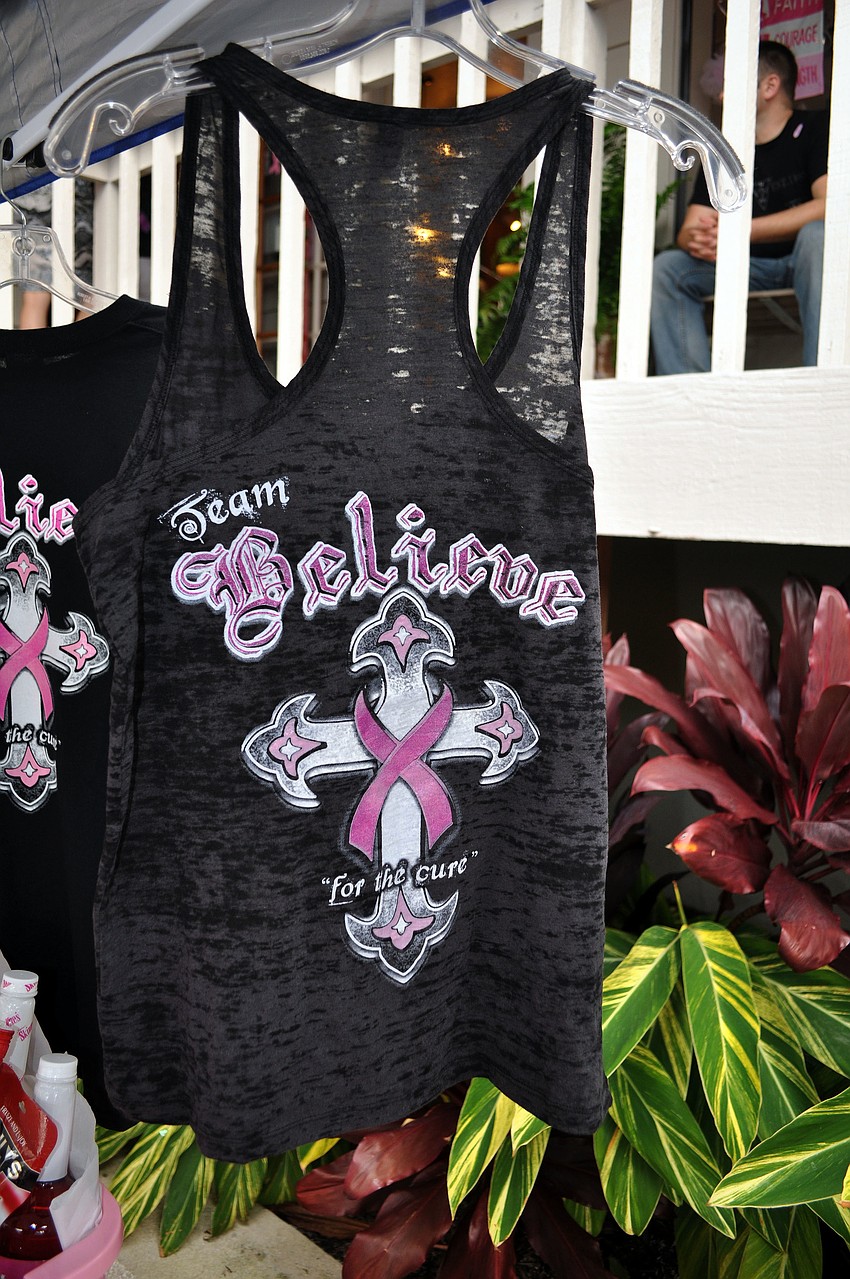 Team Believe t-shirts were hung up on the tent outside Foxy Lady and Sassy Hair Salon.