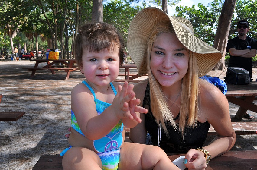 Jenny Leon, 15, right, with her little sister, Mia Gomez, 1.