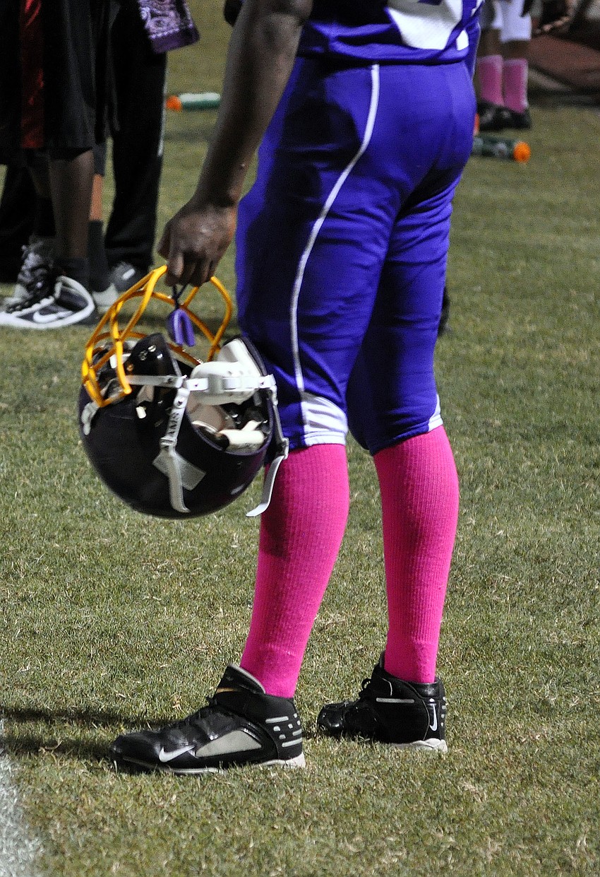 Players wore pink socks to show their support of Breast Cancer Awareness Month.