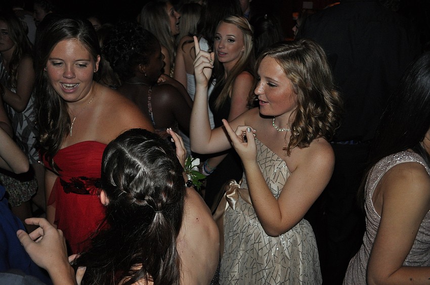 Abby Bannar, center, danced the night away with her friends at the Homecoming Dance Oct. 20.