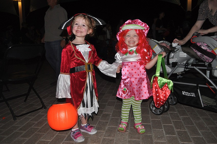 Emma Lally, 2, and Selene Bogart, 2, had fun trick-or-treating Friday, Oct. 19, during MOTEâ€™s Night of Fish, Fun and Fright.