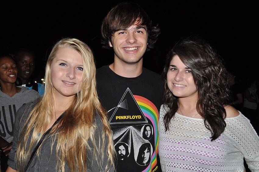 Alyssa Lambert, Michael Cairo and Delaney Troop attended the bonfire Oct. 25.