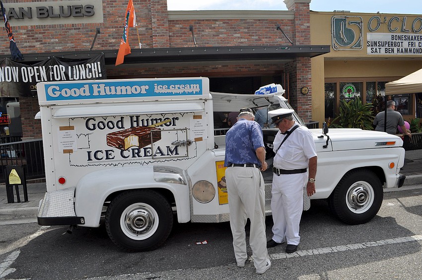 An old-fashioned Good Humor ice cream truck delivers cold treats.