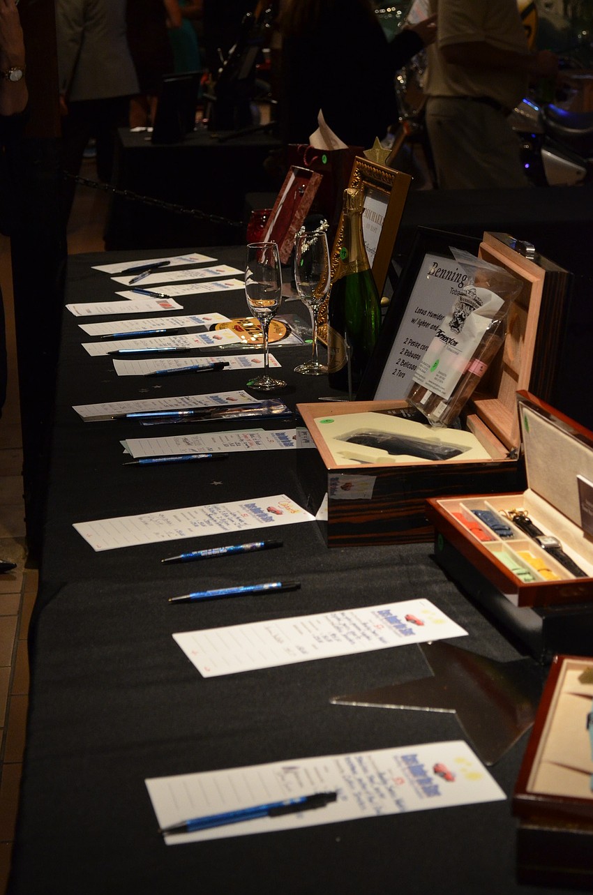 The event brought in $12,000 from the silent auction including a autographed guitar from AC/DCâ€™s Brian Johnson