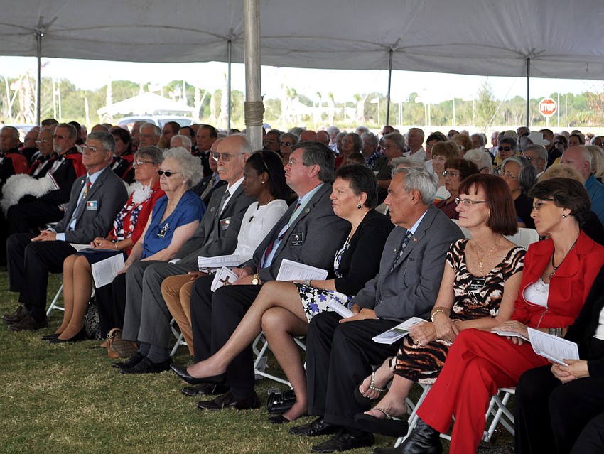 Guests watch during mass.