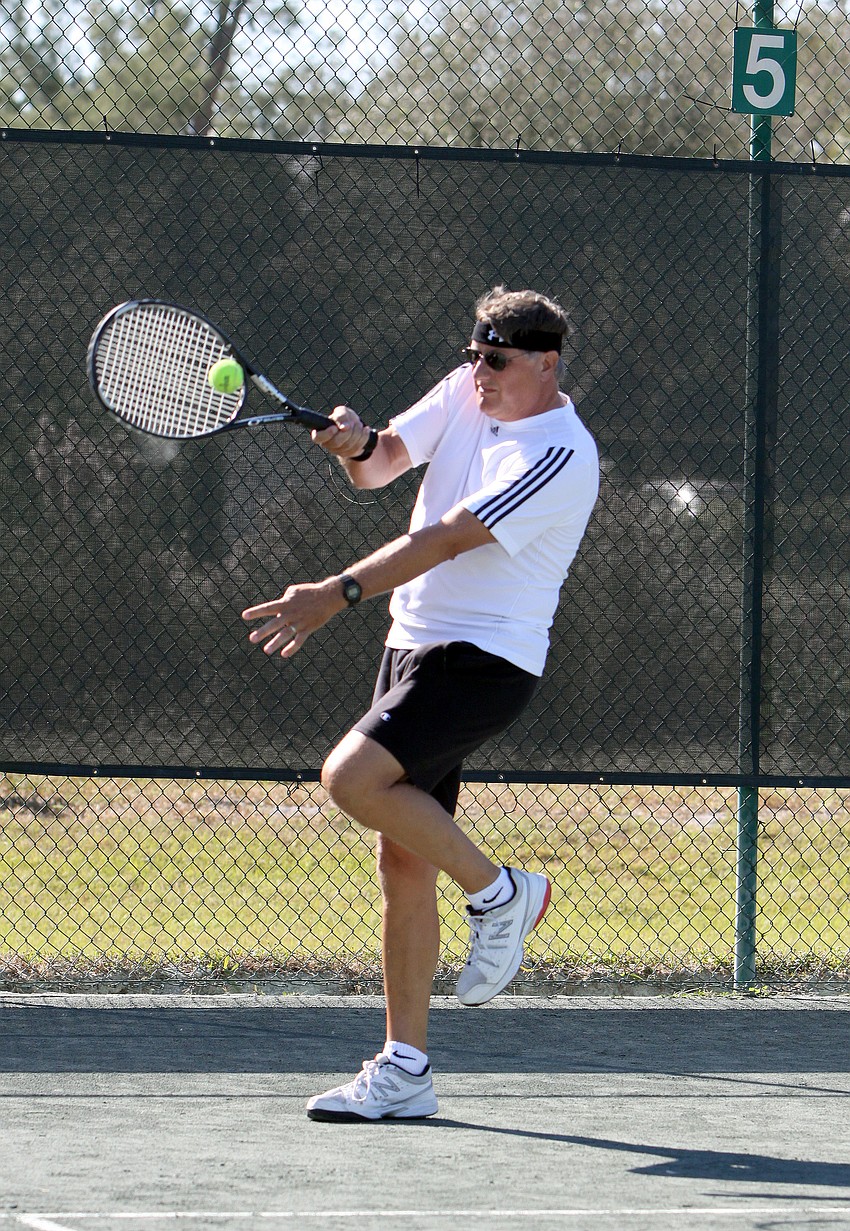 Richard Kaleida hits the ball.