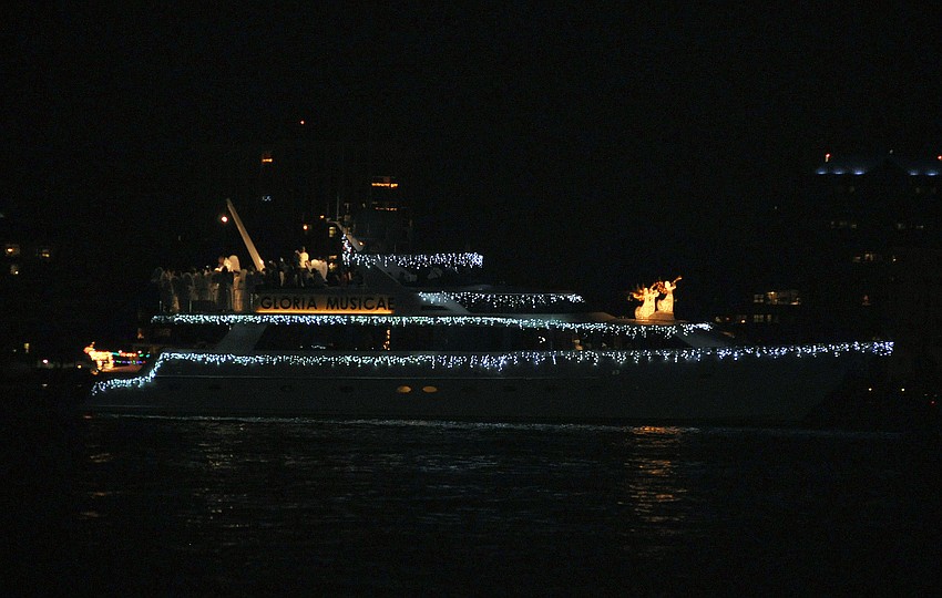 Gloria Musicae had a yacht decorated in lights with trumpeting angels on the front and a singing choir on the back.