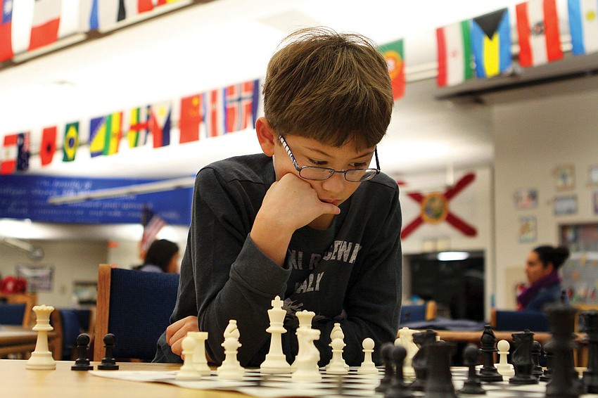 Joshua Meighan studied the board hard before making his next move in the Phillippi Shores Elementary School Chess Clubâ€™s seventh annual Tournament of Hearts.