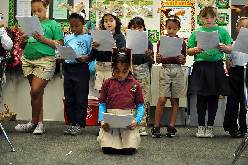 Lianna Pacheco, as Olive, and the rest of Ms. Tara Greenbaumâ€™s class practice performing â€œOlive, the other reindeerâ€.
