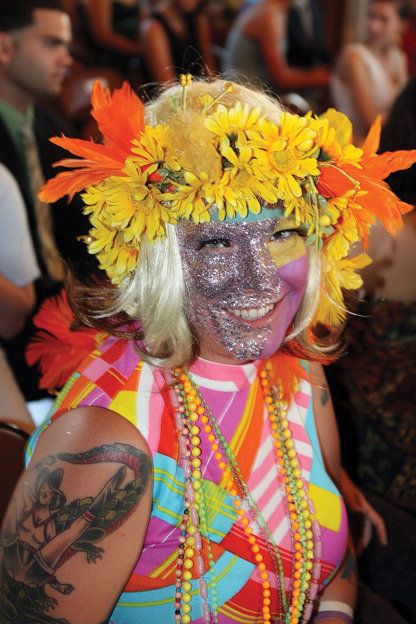 Bette Marie Gadient dressed up in a colorful outfit and wore crazy makeup to her commencement ceremony at New College.