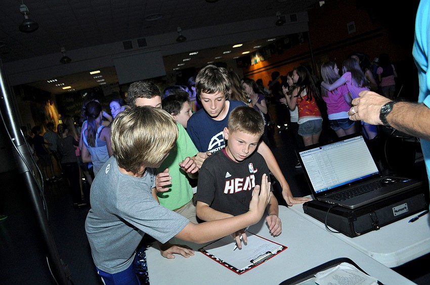 Students line up to request songs.