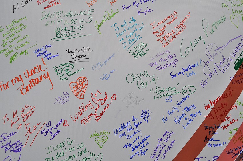Hundreds of people wrote personal messages and signed their names on the Tribute Wall at the 2012 Heart Walk.
