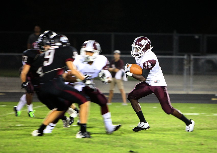 Christian Mcpherson, No. 19, makes his way up the field Friday, Sept. 21.