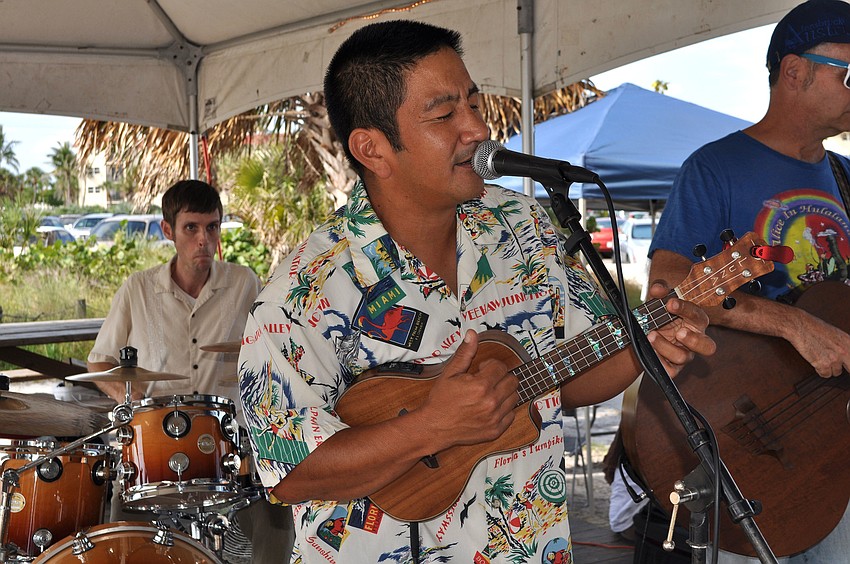 Dan Garrido plays the ukulele with his band Ukumelee.