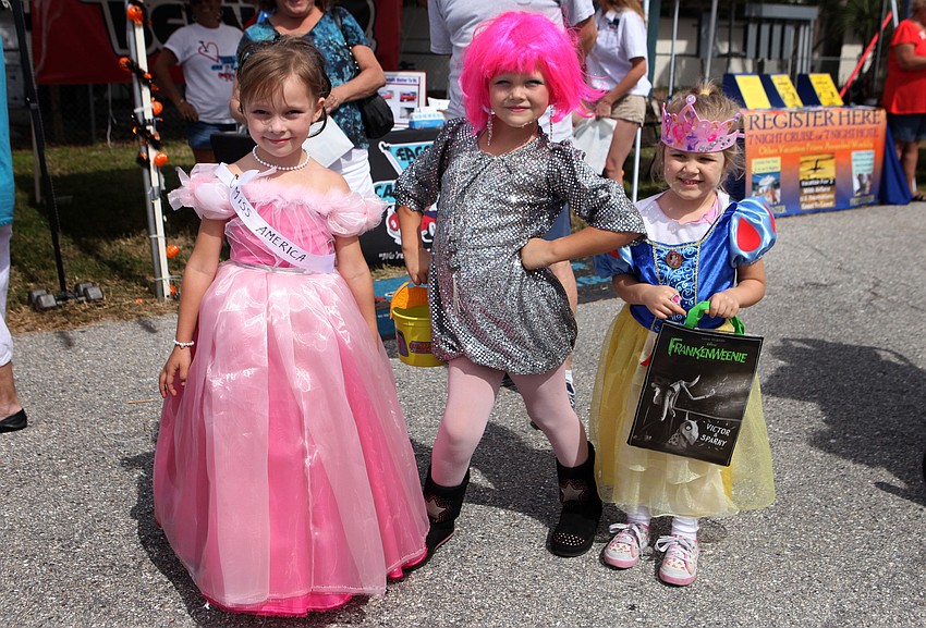 Lola Prody, 5, Maya Prody, 6, and Eliana Grogg, 4, had fun wearing their costumes Saturday, Oct. 27, at the Sarasota Pumpkin Festival.