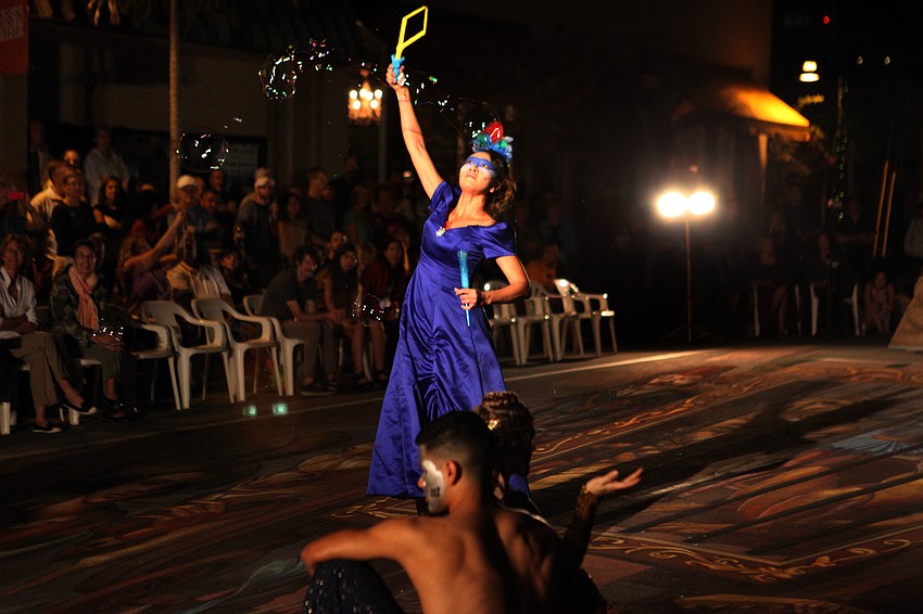 Xiaoxuan Yang waves bubbles around during her act in Fuzion Danceâ€™s â€œ3-DANCEâ€.
