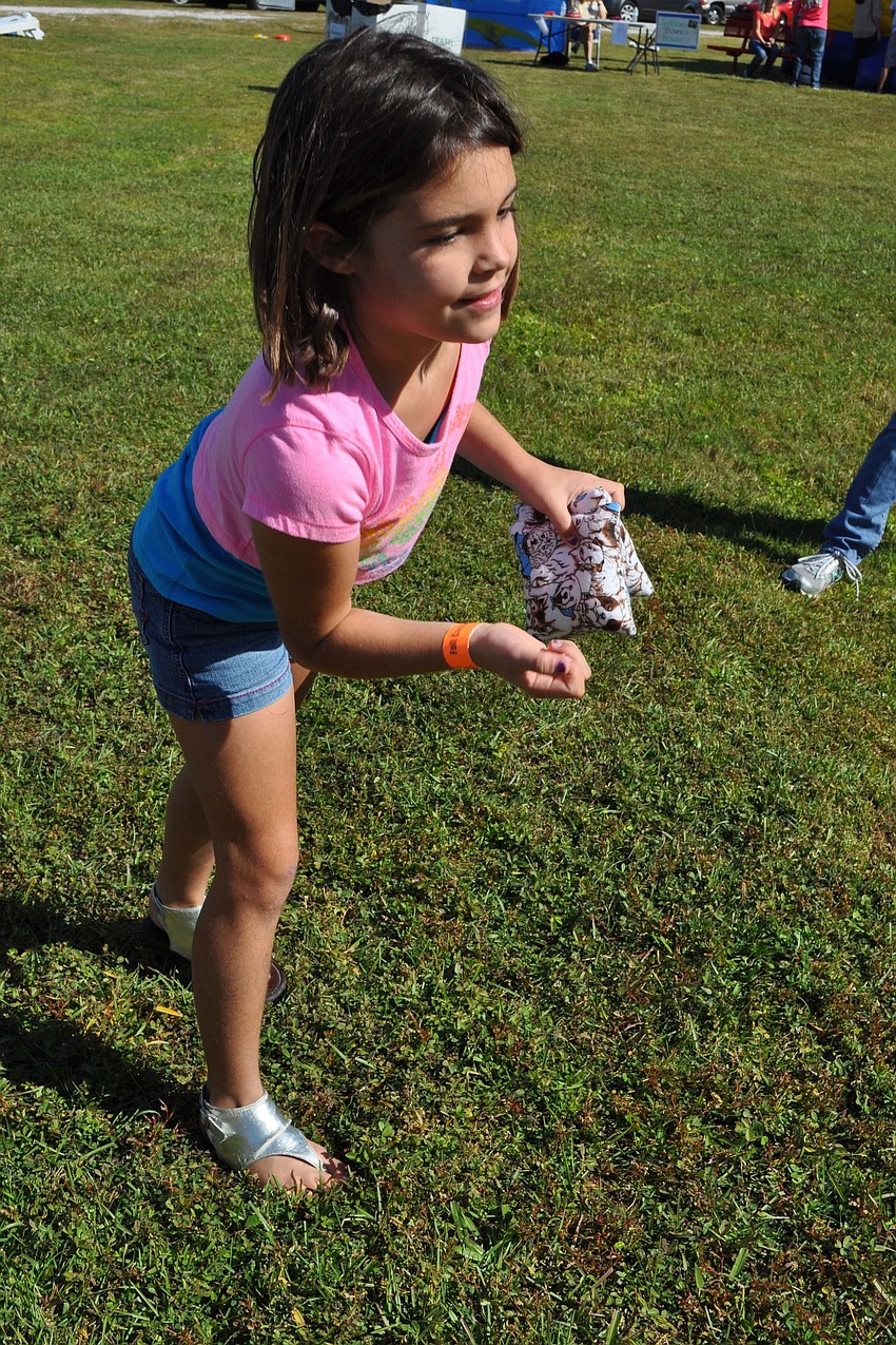 Declan Hudson had perfect aim in a beanbag toss game.