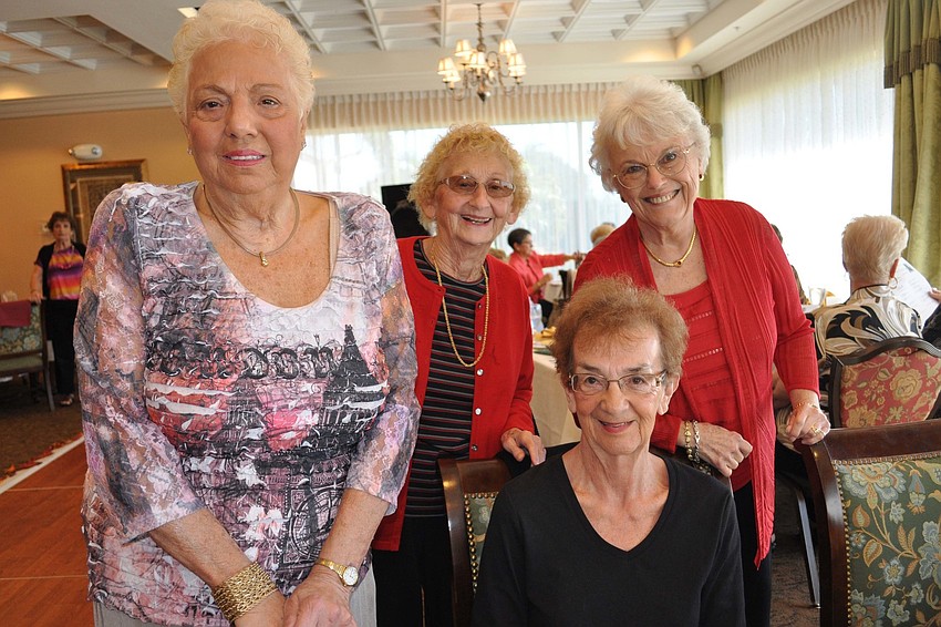 Connie Maloney, Mickey Wineinger, Pat Oien (front) and Linda Lencke sat together.