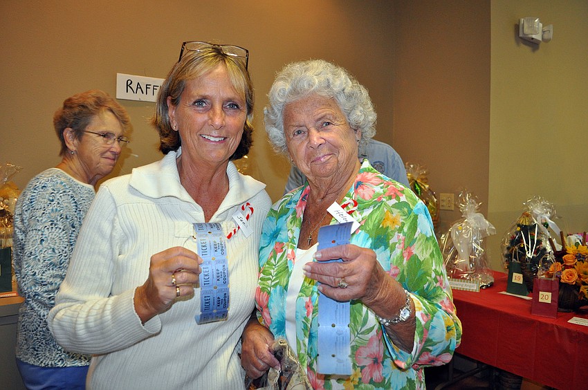 Sue Schaefer and Helen Breidenstein with their raffle tickets.